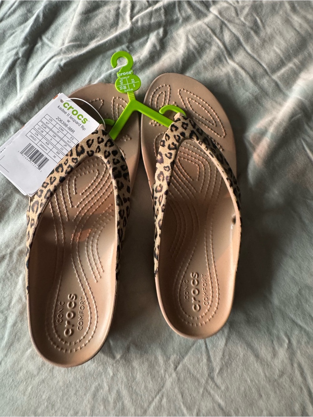 CROCS Women’s Leopard Print Flip Sandals - Tan